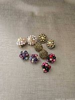 All five earring pairs arranged for overview