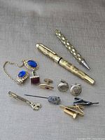 All items laid out on fabric background
