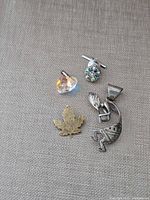 All four jewelry pieces laid out for full view