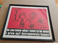 Front view of framed Peanuts quote artwork