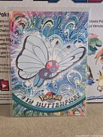 Front of Butterfree card showing foil swirl background