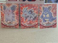 Front view of three Topps Pokémon cards #29-#31