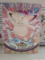 Front view of Topps Clefable card in sleeve