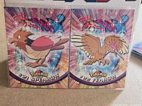 Fronts of both Spearow and Fearow cards showing holographic foil