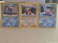 Front view of Quagsire, Shuckle and Goldeen cards side by side