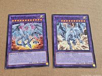 Front view of both Yu-Gi-Oh! cards side by side