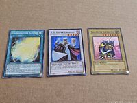 Front view of all three Yu-Gi-Oh cards side by side