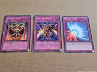 Front view of all three trap cards: Jar of Greed, Spell Vanishing, Mirror Force