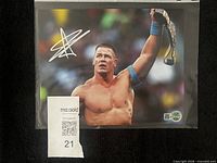Front view of signed 8x10 John Cena photo in sleeve