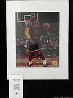 Front view showing entire matted autographed photograph