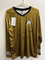 Front view of signed Star Trek uniform shirt
