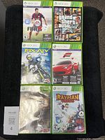 Group shot of all six Xbox 360 games