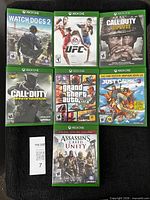 All seven Xbox One game cases laid out