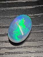 Front view of oval opal showing play-of-color