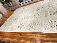 Overall view of assembled foam tile rug covering hardwood floor