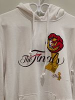 Front upper portion showing hood, drawstrings, main chest graphic
