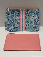Front view of both pouch and wristlet