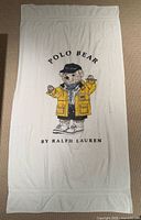Full view showing Polo Bear graphic and overall towel
