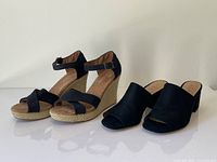 Both pairs of sandals side by side