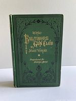 Front cover showing title and ornate green cloth binding
