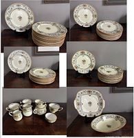 Stacked plates in various sizes, creamers, sugar bowls, vegetable bowl, handled cake plate