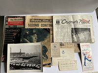 Entire lot overview showing newspapers, magazines, photographs, pamphlets