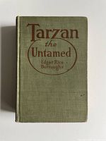 Front cover of green cloth hardcover showing title and author