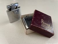 Both Prince lighters with box visible