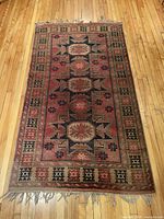 Full view of rug showing pattern, colors and size