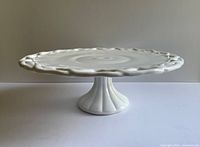 Side view showing entire pedestal cake stand profile