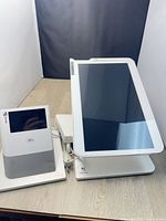 Clover Station touchscreen terminal and small NFC display on table