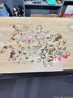 Overview of entire jewelry assortment on table