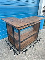 Overall view of metal and wood mini bar front and side