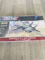 Front of sealed box showing branding, scale, parts count