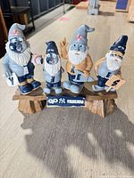 Front view of resin sculpture with four Yankees gnomes and team plaque