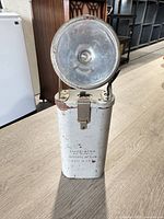 Front view showing full lamp and body