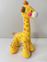 Left-side perspective of articulated giraffe toy