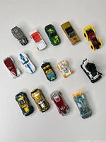 All 14 Hot Wheels cars laid out