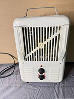 Front view showing grille, controls, overall condition
