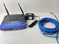 Router, power adapter and Ethernet cable overview