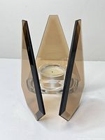Front view showing brown smoked glass panels and clear glass insert