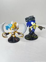 Front view of both pirate variant mini figures on bases