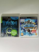 Front covers of both PS3 games showing titles and artwork