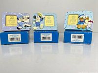 Front view of all three Disney Mickey & Pals mini photo frames on their boxes