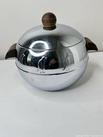 Overall view of West Bend Penguin ice bucket with lid on