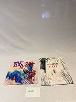 Front covers of both books side by side