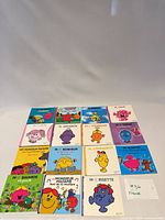 Front view showing all 15 Monsieur Madame board books, titles visible