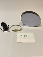 Front view of LED sign and crystal coaster with cable