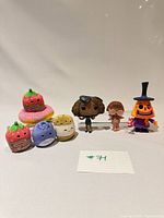 Group shot of all seven items showing scale and variety