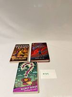 All three books front covers displayed